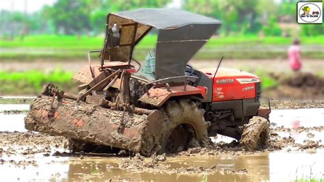 bob cat kubota stuck in mud